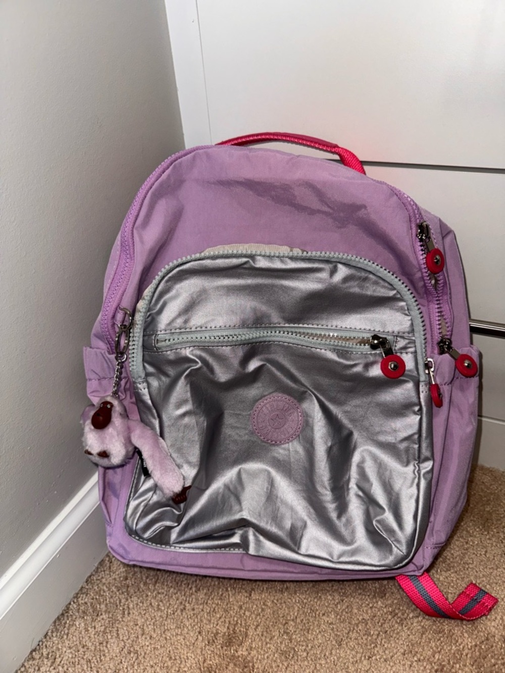 Kipling Lavender and Silver Backpack with Pink Accents